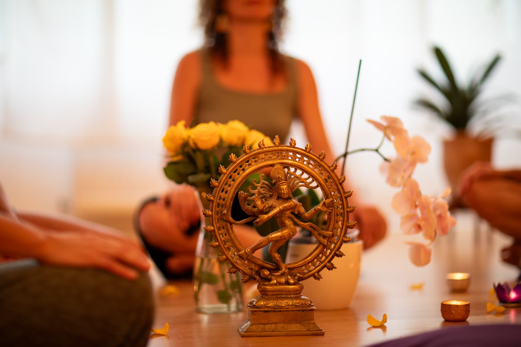 A statue of Shiva Nataraja on the altar during a Tara meditation